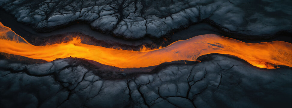 AI generated top-down aerial image of a molten lava river flowing through dark cooled volcanic rock, captured from  above showing the vivid contrast between glowing  magma and grey basal formations.