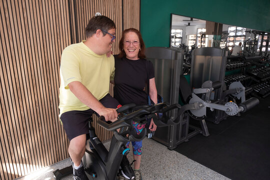 Supportive moment in gym during adapted training session