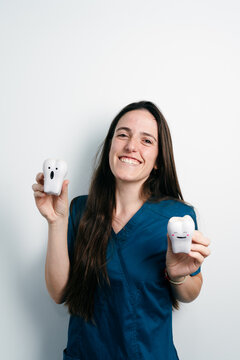 Dentist Holding Tooth Figurines