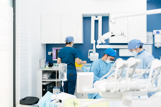 Surgical Team Performing Dental Procedure