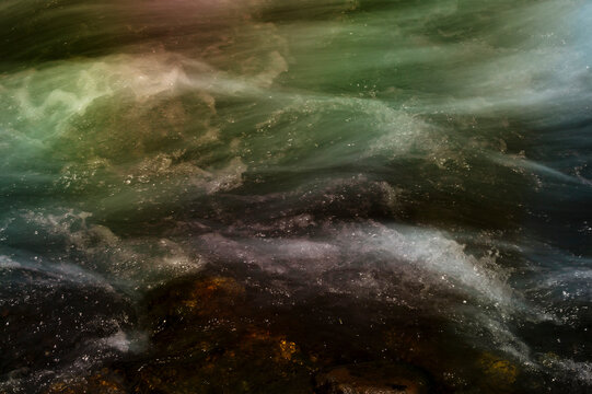 Dreamlike Flowing Water Over Rocks
