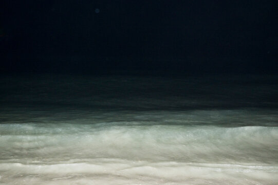 Dark Ocean Wave at Night