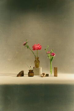 Contemporary floral composition with decorative objects
