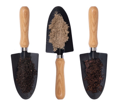 Gardening shovel with sand and soil isolated on white background 