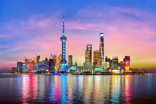 Shanghai city and Huangpu river at twilight, China.
