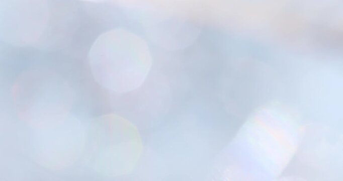 Bokeh flare lights abstract background, defocused caustic photo effect with circle drifting particles for festive celebration, party and design.