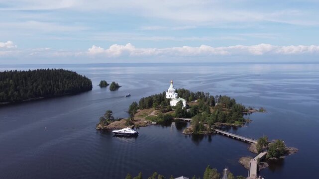 Aerial Drone Flight Over Small Island with Orthodox Chapel on Lake Ladoga, Valaam Archipelago, Karelia, Russia, 4K
