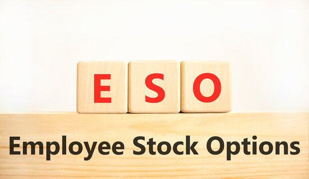 ESO employee stock options symbol. Concept words ESO employee stock options on beautiful wooden blocks. Beautiful white background. Business ESO employee stock options concept. Copy space.