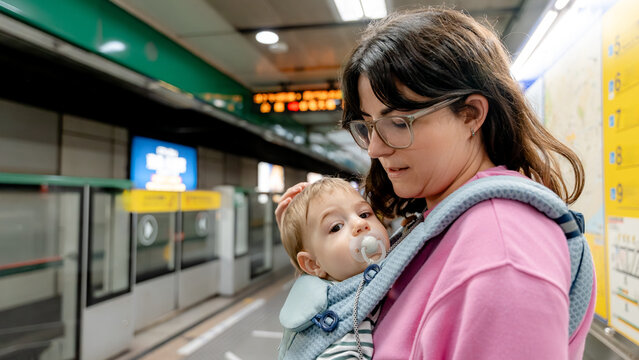 Mother with baby in Taipei Metro station