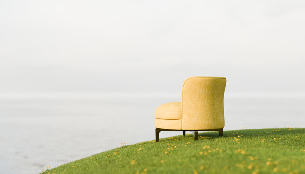 Peaceful chair by the sea on a grassy hill