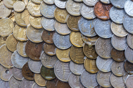 Assorted vintage coins in various currencies