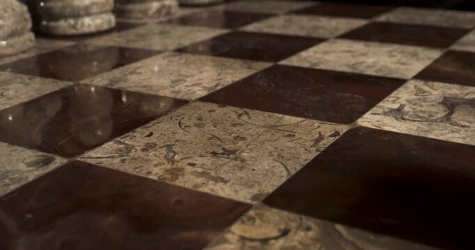Elegant Chessboard With Polished Marble Tiles and Rich Texture