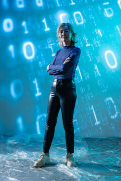 Futuristic senior Asian woman with digital data backdrop