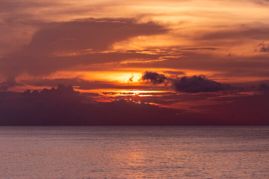 Tropical sunset over calm sea at Koh Tao, Thailand