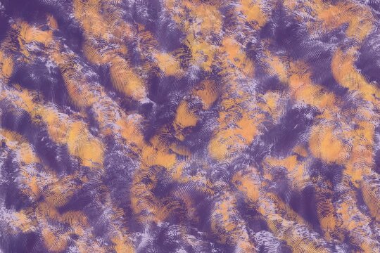 Abstract purple and gold textured background with swirls