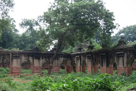 Ruins of Buddhist monastery in Myanmar with arches