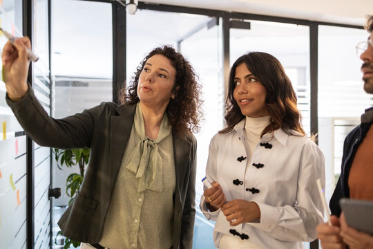 Collaborative team brainstorming in a modern coworking office