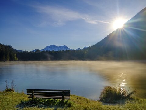 Lonely bench at Hintersee, in the back Hoher G&ouml;ll, Berchtesgaden National Park, Ramsau, Upper Bavaria, Bavaria, Germany