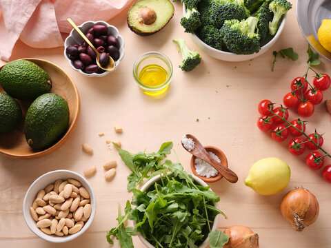 Cooking healthy meal with fresh ingredients on wooden table