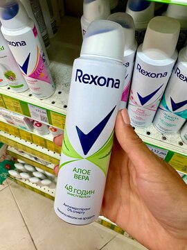 19.06.2026 Ukraine Kharkov, Hand Holding Rexona Aloe Vera Deodorant Spray in a Supermarket
