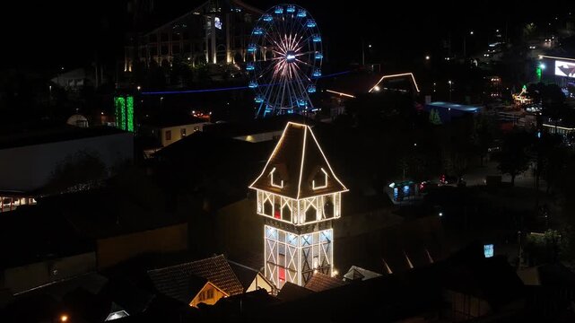 Capivari Village In Campos Do Jordao Sao Paulo Brazil. Bird Eye View Of Stunning Ferris Wheel In A Amusement Park. Night Illuminated Skyline. Illuminated Skyline. Campos do Jordao Sao Paulo.