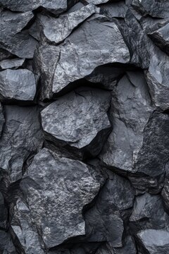 Close-up of dark, rugged shale rock texture with natural patterns
