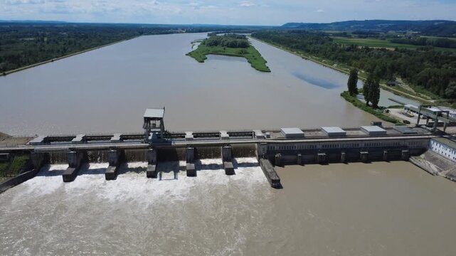Aerial orbit of Ering-Frauenstein hydropower plant with open weir