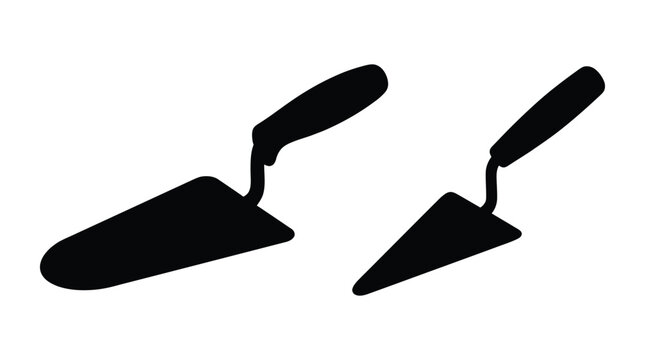 Two trowels in black silhouette against a white background