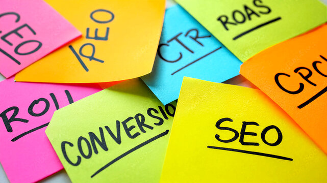 A collection of colorful sticky notes with digital marketing terms written on them