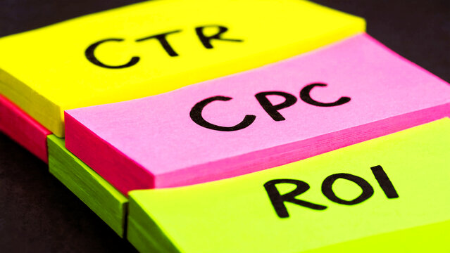 A close-up of colorful sticky notes with business terms written on them