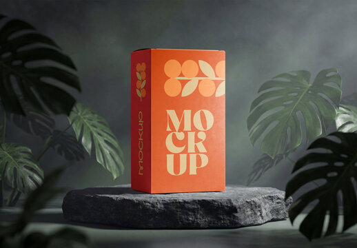 Product Box Mockup on Stone Pedestal with Tropical Leaves and Dark Background