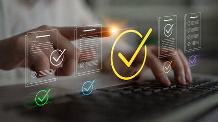 Obraz na płótnie Canvas A close-up view of hands holding a pen ready to approve documents, illustrated with colorful checkmark icons, representing meticulousness in project management and team collaboration. Cyphers