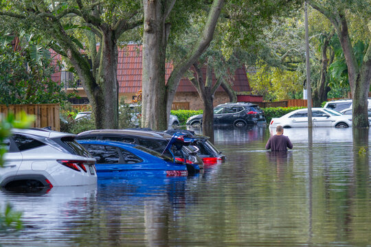 Florida after a hurricane. Flooded residential neighborhood. Submerged cars, flooded streets and homes. Weather, natural disasters and climate change