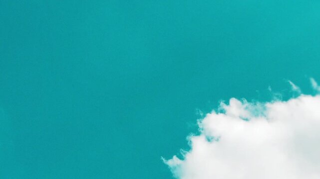 Cinematic teal color graded sky with white clouds moving, stylized film look summer sky timelapse as a scenic background for travel lifestyle and outdoor content 16:9