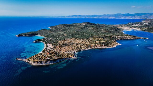 Aerial views of the coastal area off Bademli Neighborhood in Dikili, İzmir, Turkey, featuring Kalem Island, Garip Island, Aquarium Bay, Pissa Bay, and Hanımın Bay.
