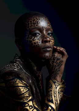 Portrait of a woman with leopard face paint and stylish outfit against a dark background emphasizing beauty and cultural expression