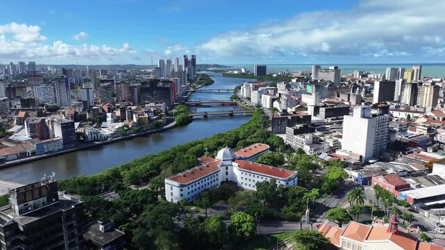 Riverfront Scene In Recife Pernambuco Brazil. Tropical River With A Scenic Forest Trees Viewed From Above. District Skyline. Cities Of The World Landscape. Recife Pernambuco.