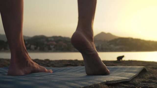 Woman finding balance and inner calm while practicing yoga on a serene beach at sunset, embodying mindfulness and personal growth.