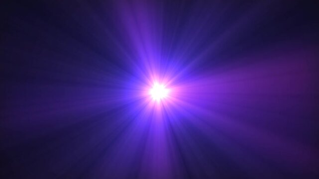 Glowing blue purple light rays burst with lens flare effect. Sparkling star light explosion, Shine magic light overlay, Bright spotlight glitter effect. Glow light rays background loop motion.4k video