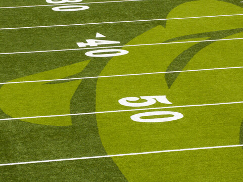 Vibrant green football field close-up