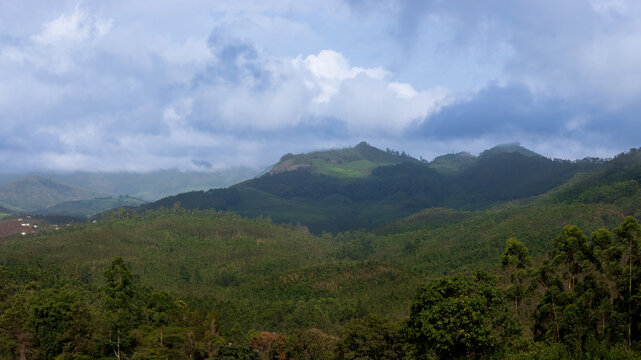 Panoramic View of Misty Hills and Lush Green Valleys in Munnar, Kerala, India