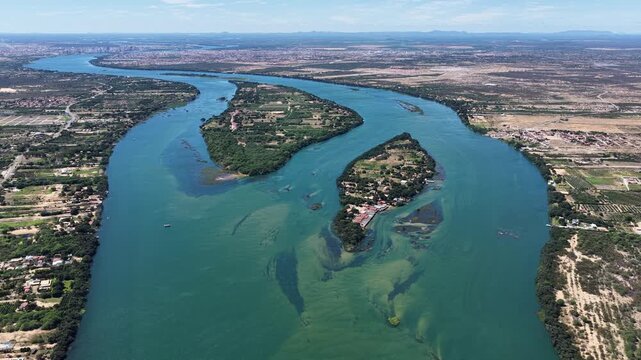 Sao Francisco River In Juazeiro Bahia Brazil. Aerial View Of A River Surrounded By Lush Green Tropical Rainforest. Wildlife Eco Tourism. Amazon Forest. Juazeiro Bahia.