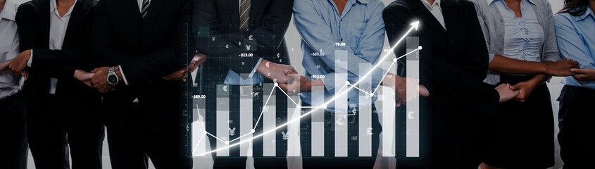 A diverse business team stands confidently with hands crossed, embodying collaboration and success, with an overlaid financial growth graph highlighting potential. Axiom © InfiniteFlow