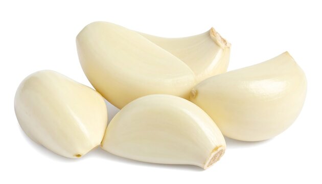 Close-up of peeled garlic cloves against a clean white background, showcasing smooth textures