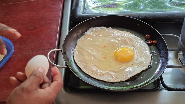 Cooking eggs with an omelet in a pan
