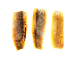 Freshly packed herring fillets in yellow brine. Clear plastic container. Fish scales visible. Food for ready to eat meals. Ready for cooking or eating. Popular tasty sea product. © mark_gusev