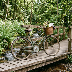 Fototapeta premium Classic vintage bicycle parked on a wooden deck in forest.