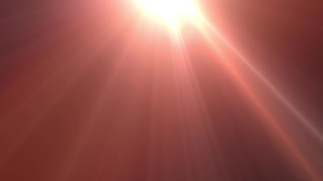 Vivid red light beams shine intensely. Radiant rays stretch across the frame