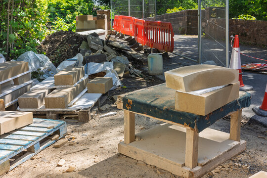 Sandstone bridge coping stones prepared for historic bridge restoration