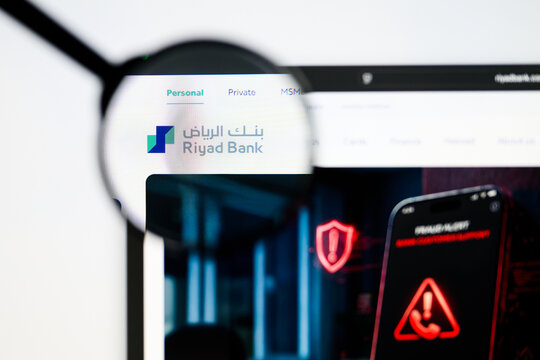 Milan, Italy 2026, 5 Jul Closeup of Riyad Bank website page on a laptop screen. Focus on Riyad Bank logo under a magnifying glass.
